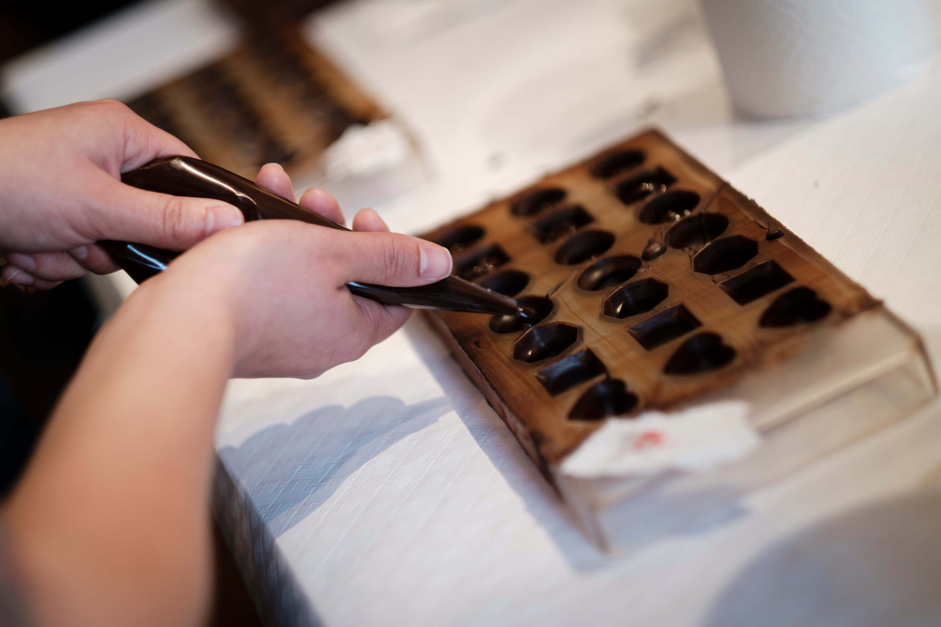 fill up chocolates by yourself at our workshop in Cusco